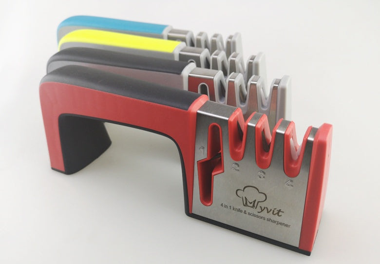 A Four-in-one Family Uses A Sharpener To Sharpen A Kitchen Knife snapshop